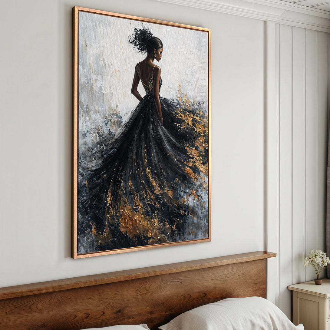 Framed Wall Art featuring an elegant woman in a black and gold dress. Abstract style with a neutral and luxurious color palette. Perfect bedroom decor.