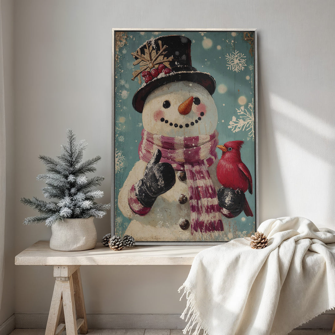 Framed Wall Art: Charming snowman print with a red cardinal, vintage style, and a cozy teal and red color palette. Perfect winter decor!
