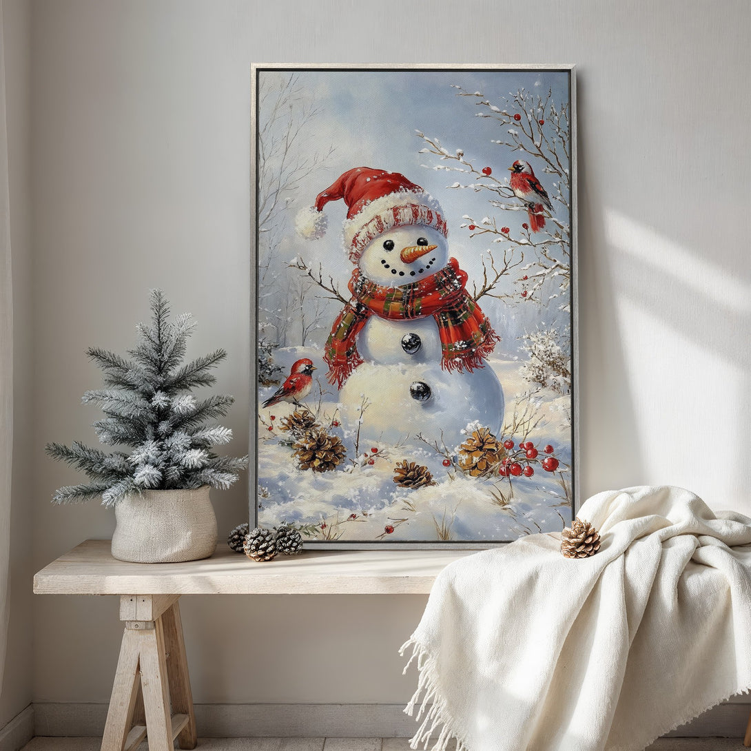 Framed Wall Art featuring a charming snowman in a winter scene. Cozy, painterly style with a red, white, and blue color palette. Perfect for holiday decor!
