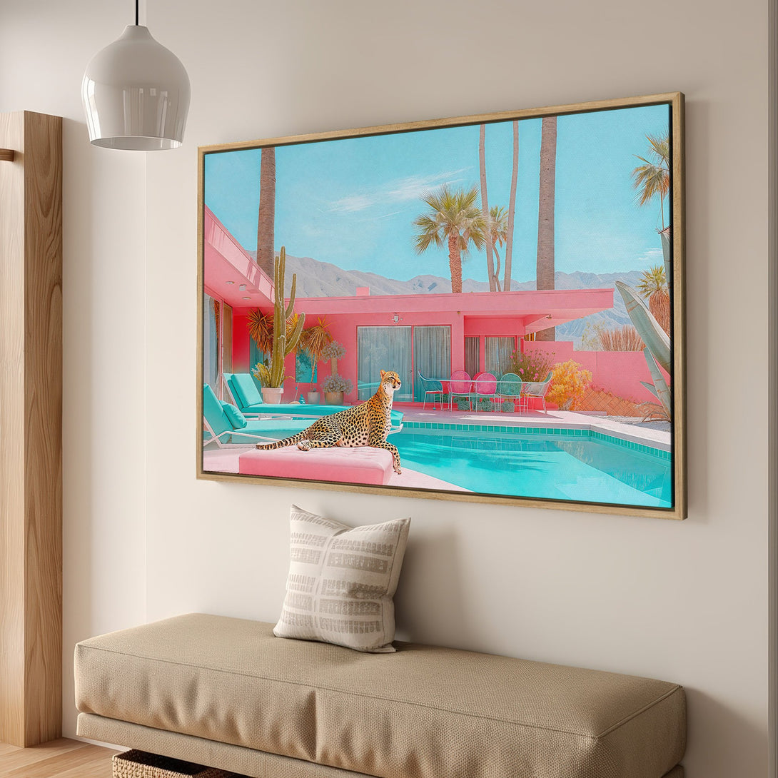 Framed Wall Art featuring a retro Palm Springs scene with a leopard, in a vibrant pink and turquoise color palette. Perfect for adding a touch of glamour!