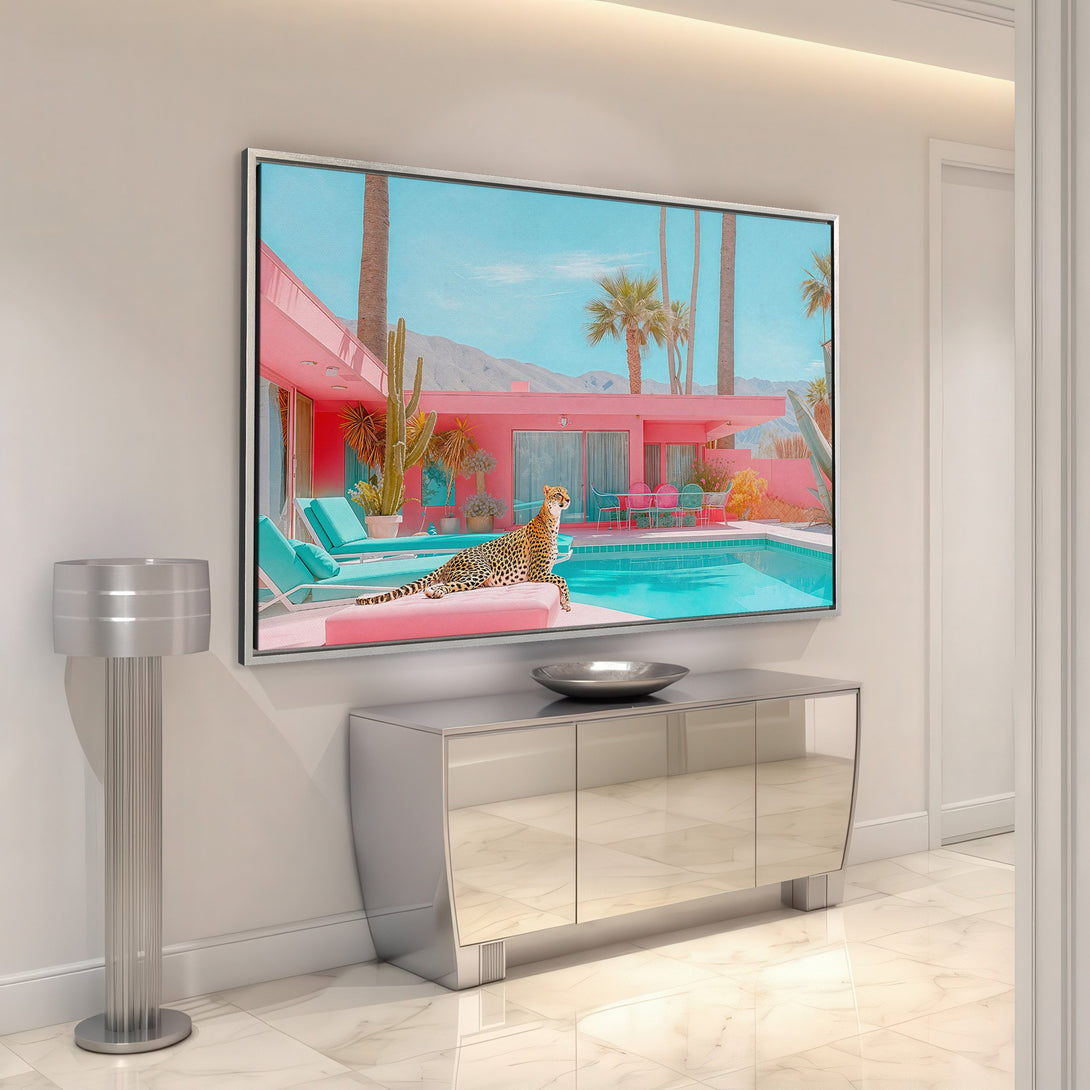 Framed Wall Art: Leopard by pool in retro pink & turquoise scene. Perfect for adding a pop of color and Palm Springs vibes to your home decor.