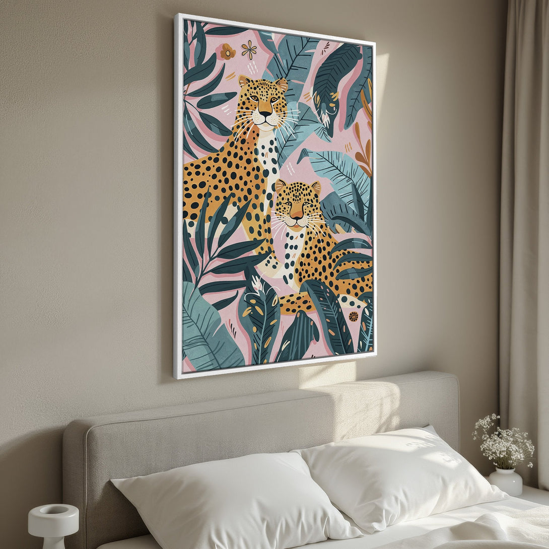 Framed Wall Art featuring leopards in a jungle scene. Modern, colorful art with pink, teal, and gold tones. Perfect for adding a touch of nature to your home.