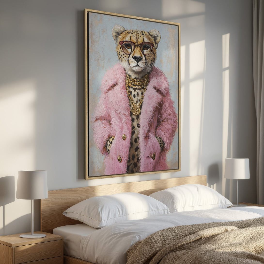 Framed Wall Art featuring a cheetah in a pink coat. Stylish and whimsical artwork with a soft, pastel color palette, perfect for bedroom decor.