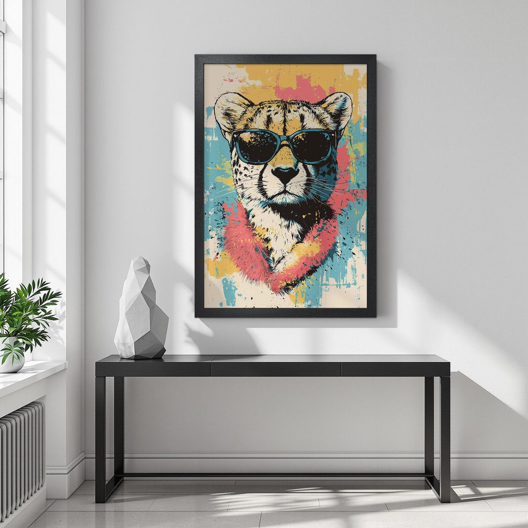 Framed Poster featuring a cool cheetah in sunglasses. Pop art style with a colorful palette of blue, pink, and yellow. Perfect wall art!