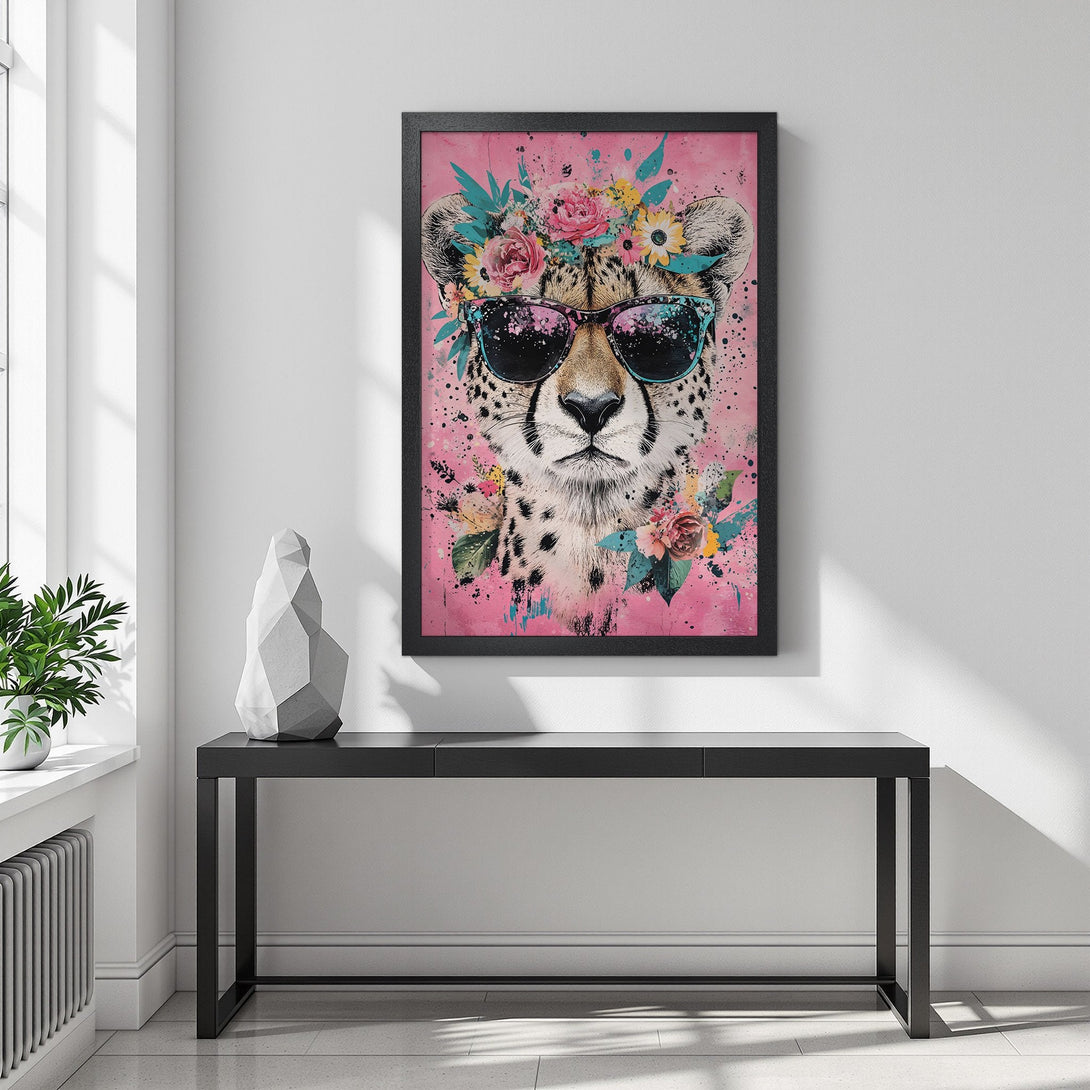 Framed Poster featuring a cool cheetah wearing sunglasses and floral crown. Vibrant pink, teal, and yellow color palette. Perfect wall art!