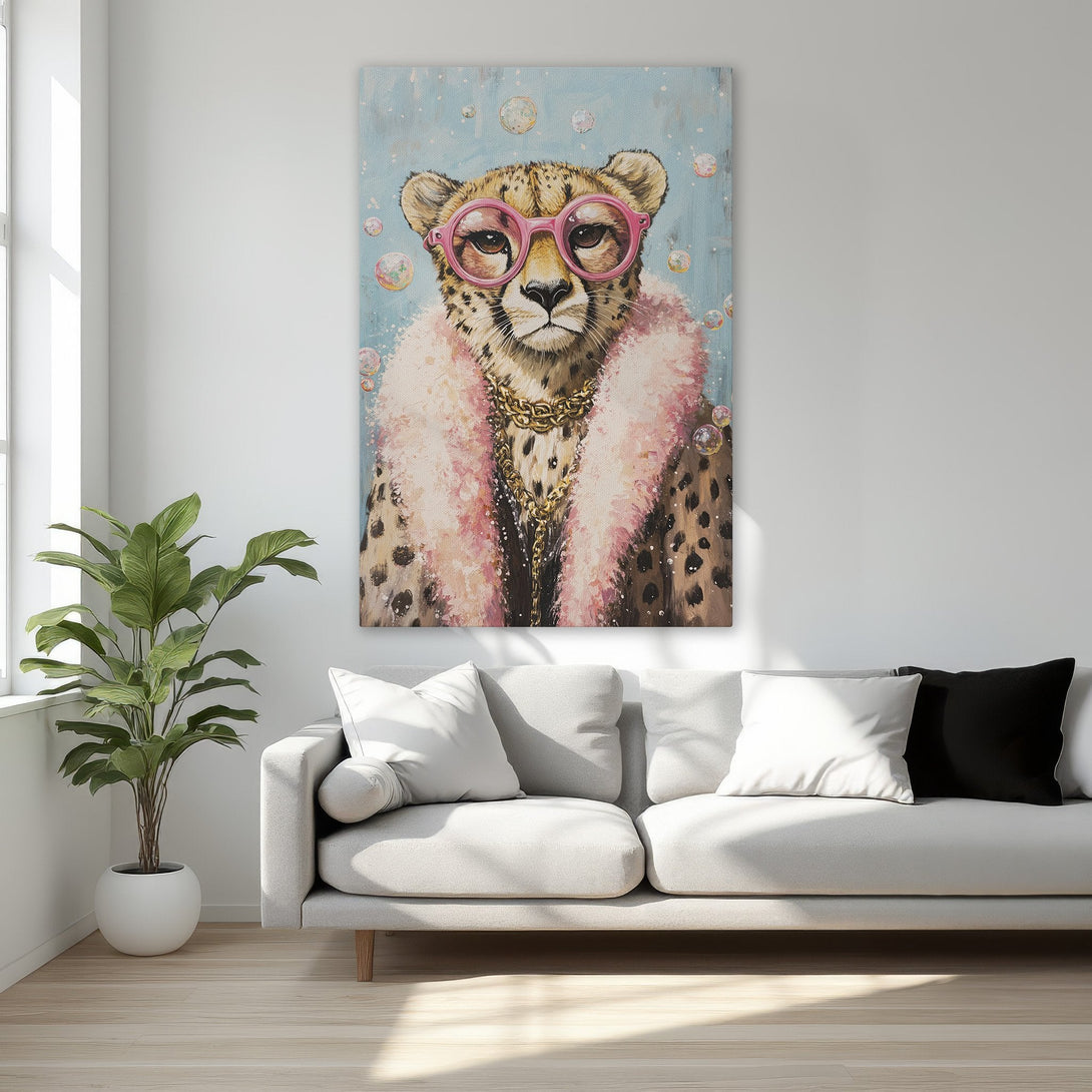 Framed Wall Art featuring a stylish cheetah wearing pink glasses and a fur coat, set against a blue background. A fun, modern art piece with a playful color palette.