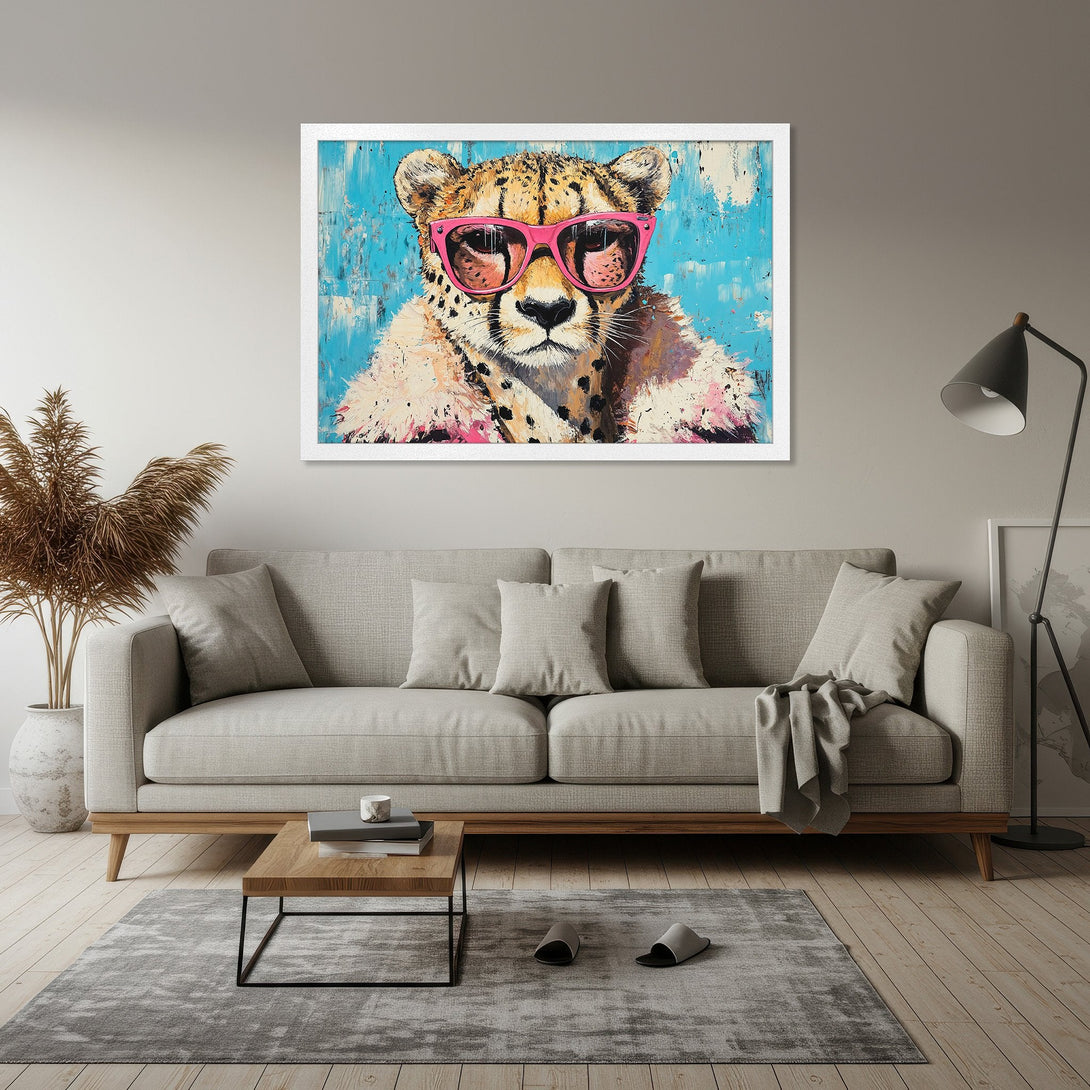 Framed Poster featuring a cheetah wearing pink sunglasses, vibrant abstract style, blue, pink, and neutral color palette. Add a touch of cool to your space!