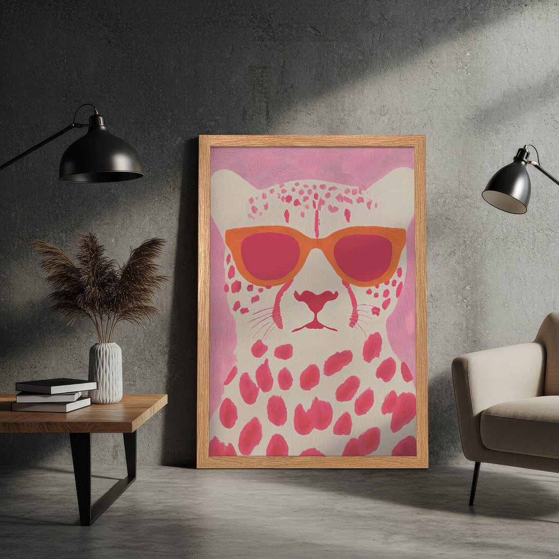 Framed Poster featuring a stylish cheetah wearing sunglasses, pop art style, pink and orange color palette. Add a touch of cool to your space!