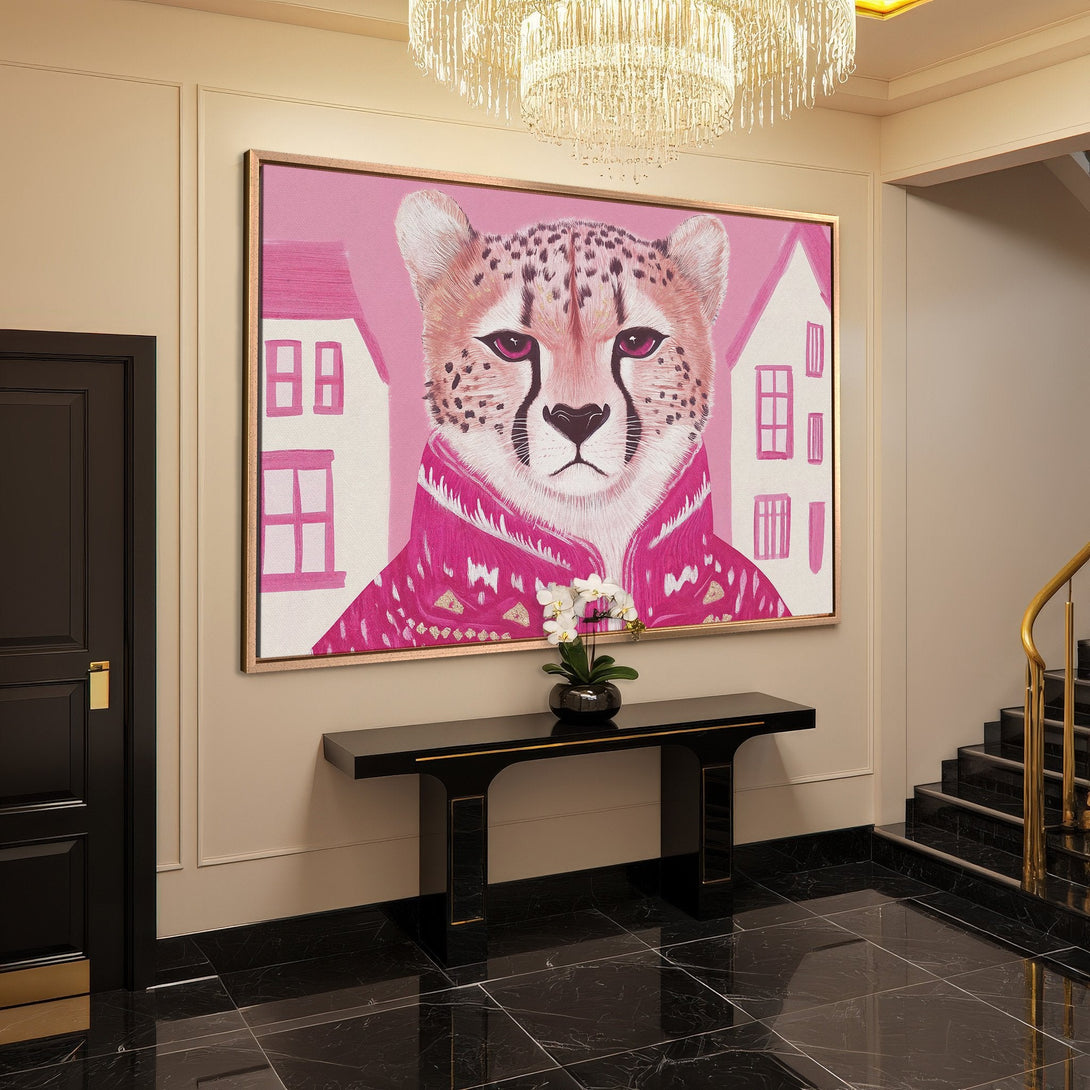 Framed Wall Art: Whimsical cheetah portrait in pink & gold, displayed in a chic interior. Modern art for a stylish home.