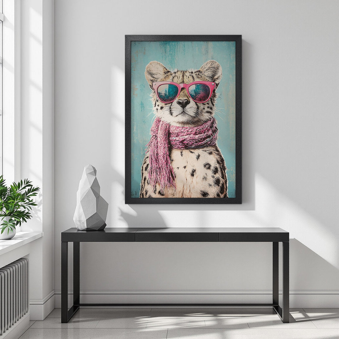 Framed Poster featuring a cool cheetah wearing sunglasses and a pink scarf. Playful art with a teal and pink color palette. Perfect wall decor!