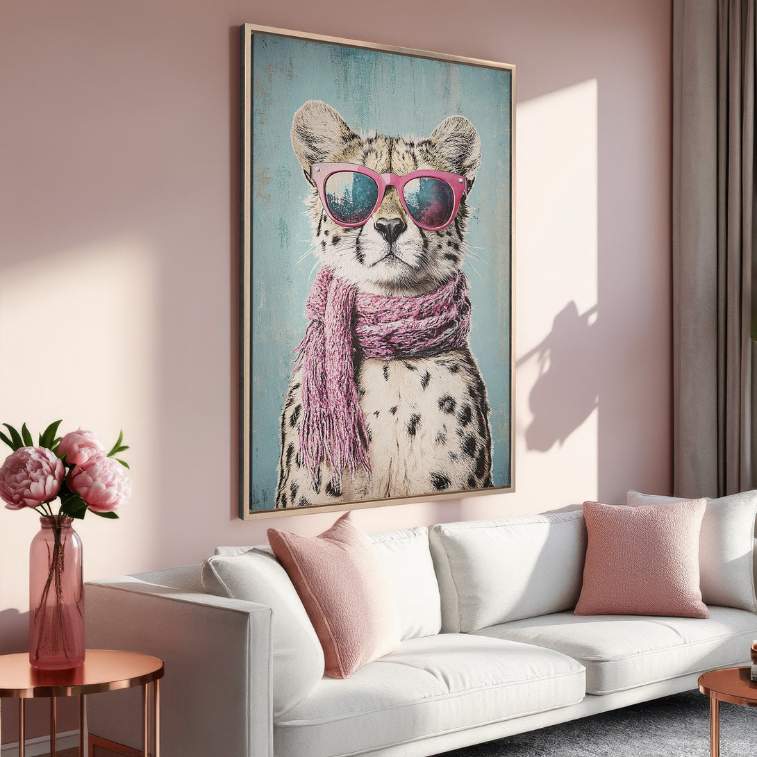Framed Wall Art featuring a cheetah in sunglasses, pink scarf, and a blue background. Perfect for adding a touch of fun to your home decor!