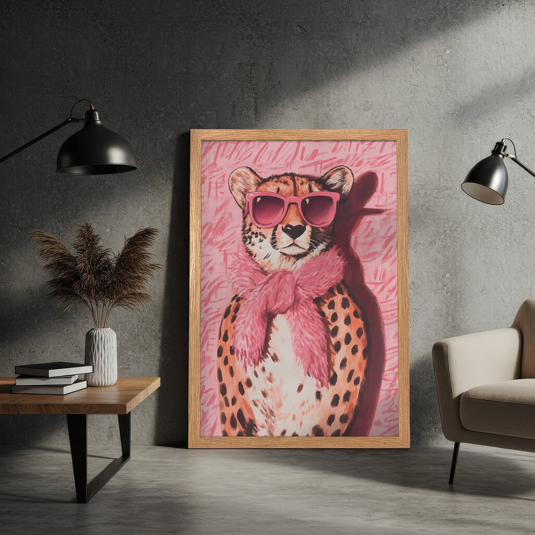 Framed Poster featuring a stylish cheetah in pink sunglasses and scarf. Modern art with a pink and orange color palette.