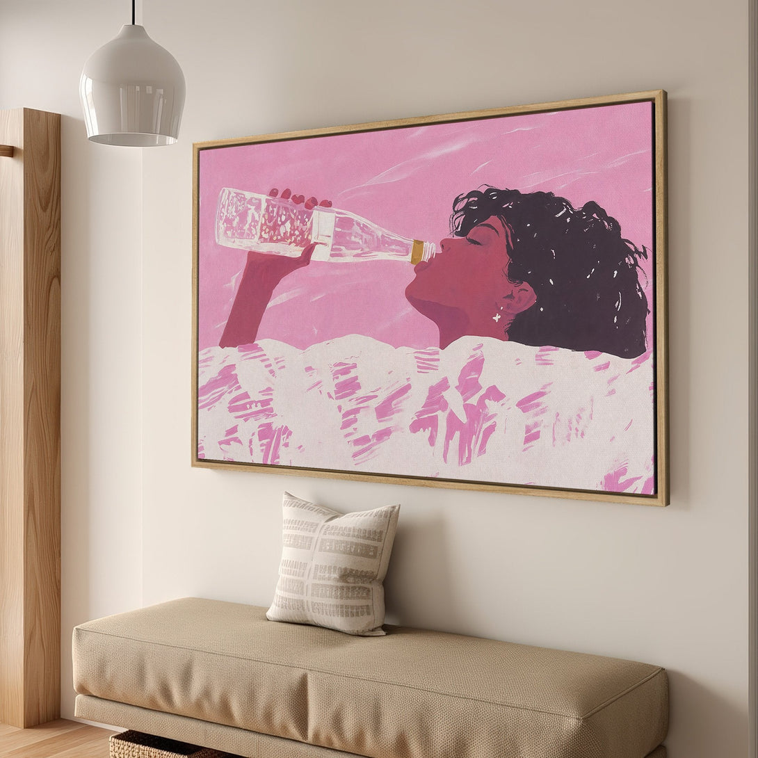 Framed Wall Art: Woman drinking water, pop art style, pink & purple color palette. Add a pop of color to your space with this stunning canvas print!