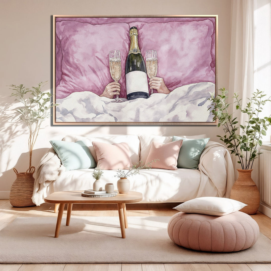 Framed Wall Art: Watercolor champagne bottle & glasses in bed, blush pink & neutral tones. Perfect for a cozy, romantic living room. Shop now!