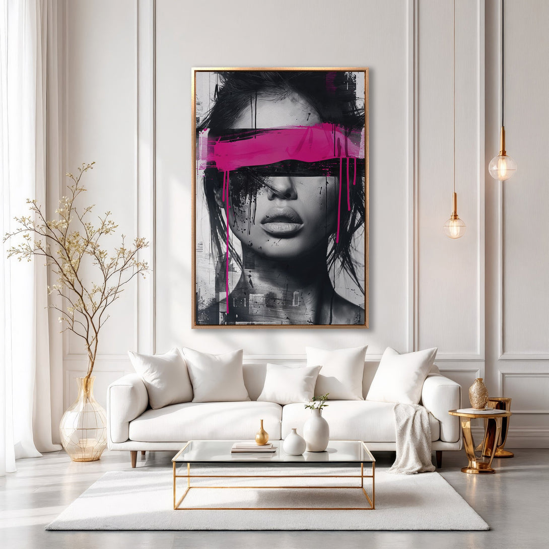 Framed Wall Art featuring a woman with pink accents, modern abstract style, displayed in a chic living room. Black, white, and pink color palette.
