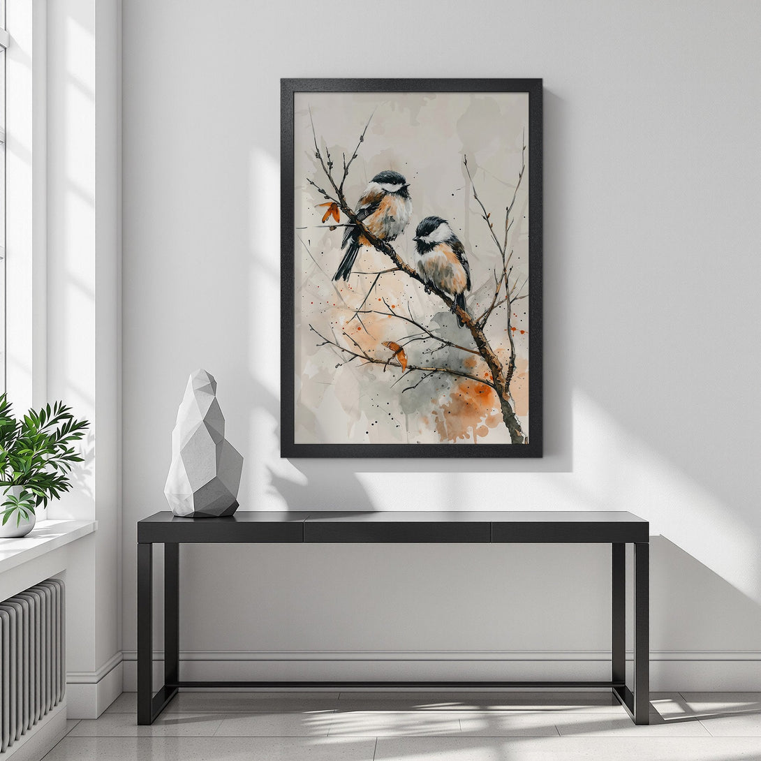 Framed Poster featuring watercolor birds on a branch. Neutral color palette with pops of orange. Perfect wall art for your home!
