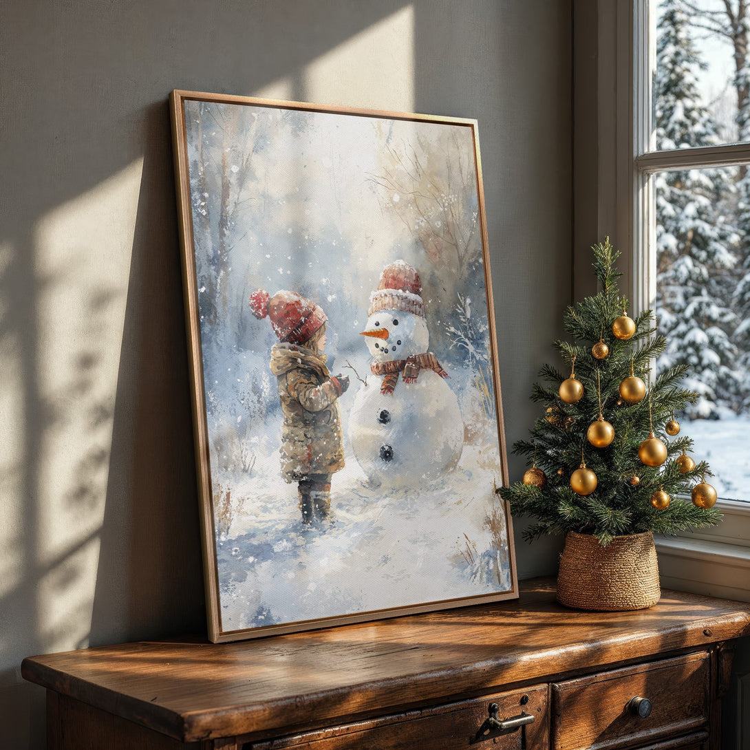 Framed Wall Art: Watercolor winter scene of child and snowman. Soft blues, whites, and warm browns. Perfect holiday decor for a cozy home.