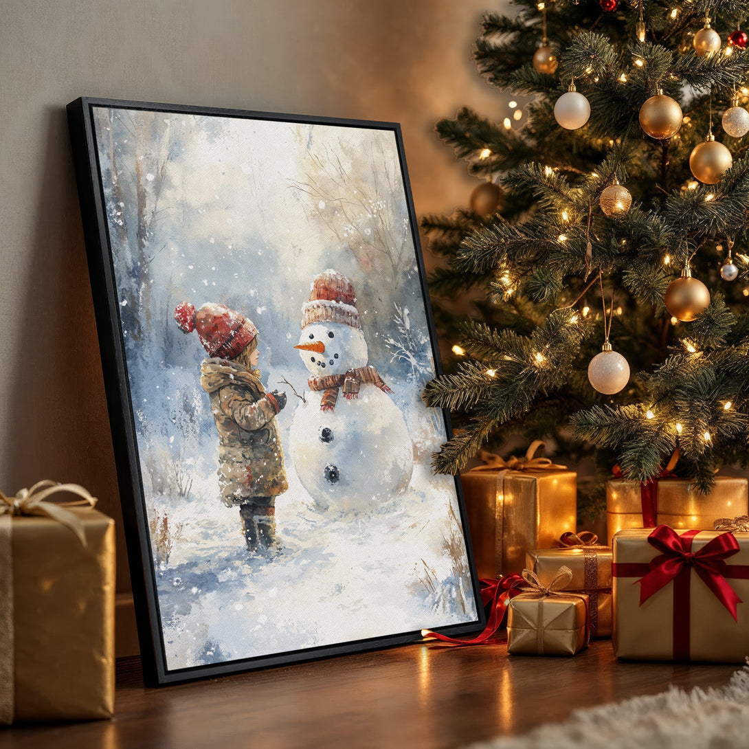 Framed Wall Art: Watercolor painting of child building snowman in winter scene. Soft blues, whites, and browns create a cozy, festive feel. Perfect holiday decor!