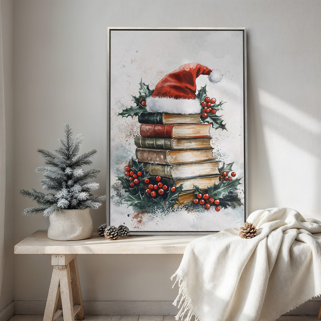 Framed Wall Art featuring a watercolor-style Christmas scene with a Santa hat, books, and holly. Warm, inviting color palette of reds, greens, and neutrals. Perfect holiday decor.