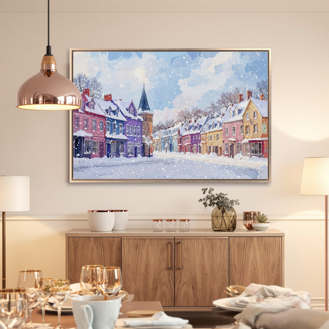 Framed Wall Art: Winter village scene canvas print with colorful houses, snowy street, and blue sky. Perfect for adding a cozy touch to your home.