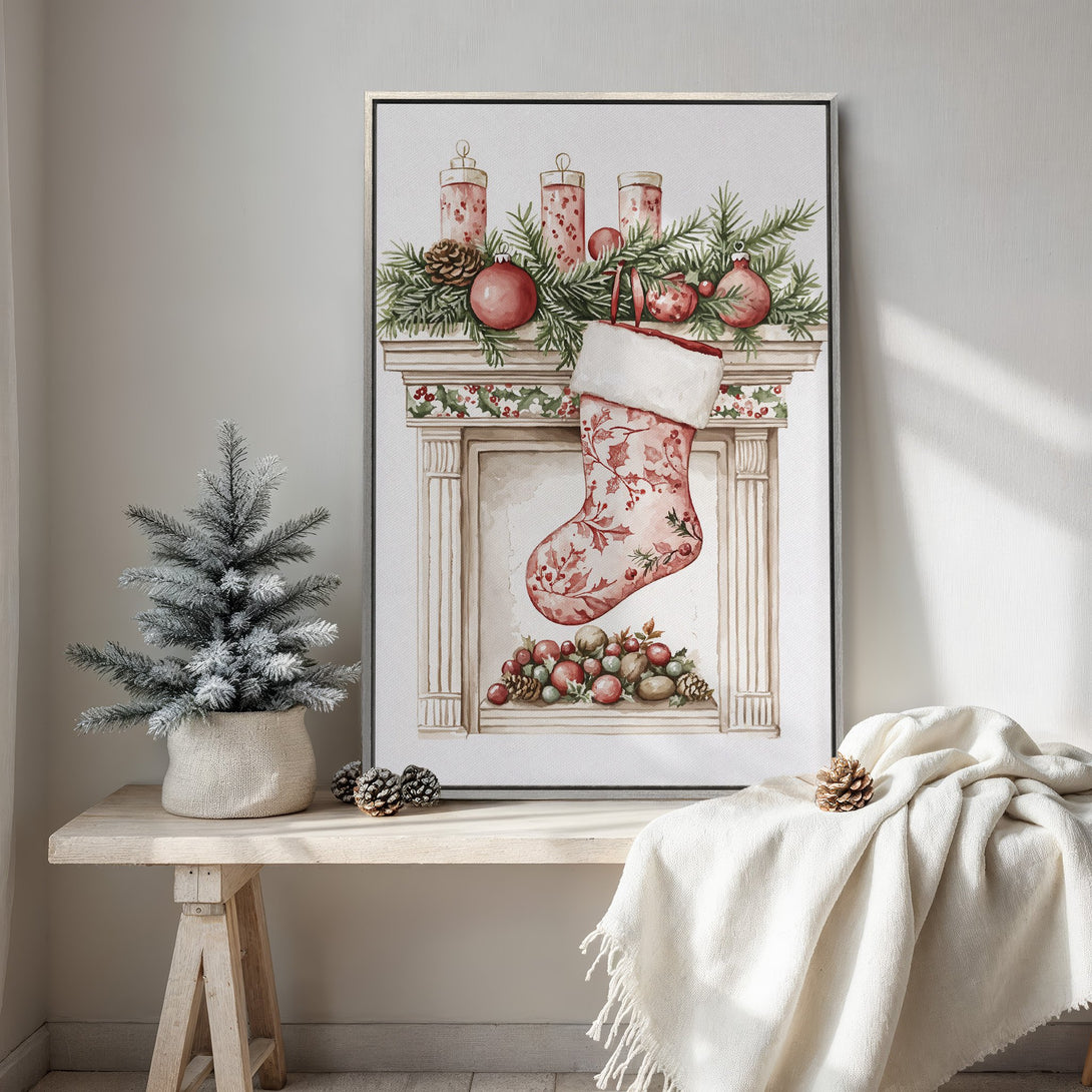 Framed Wall Art featuring a watercolor Christmas scene with a stocking, fireplace, and ornaments. Warm red and green color palette, perfect holiday decor.