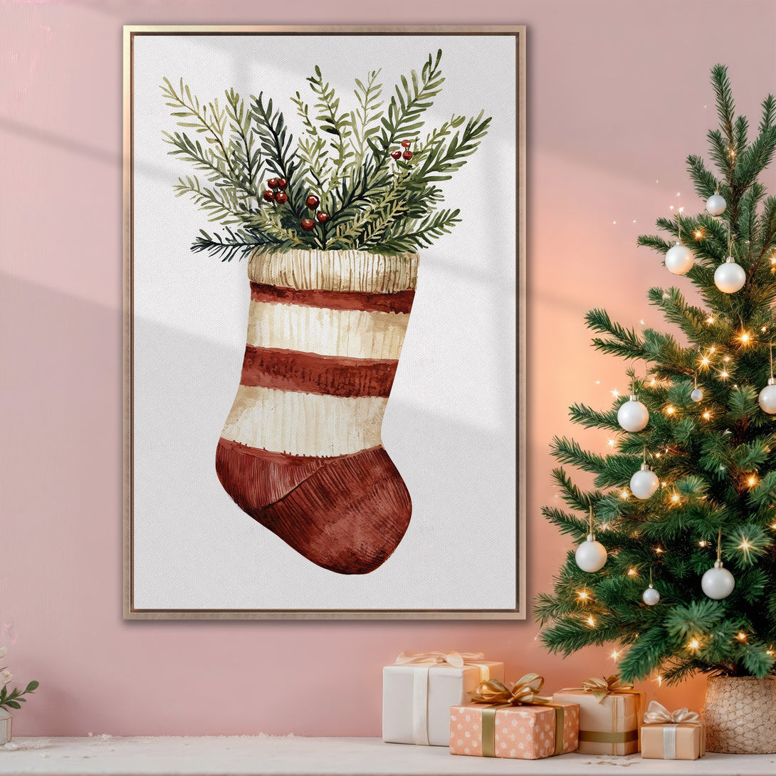 Framed Wall Art featuring a watercolor Christmas stocking with greenery, warm red and green tones. Perfect holiday decor for a cozy, festive home.