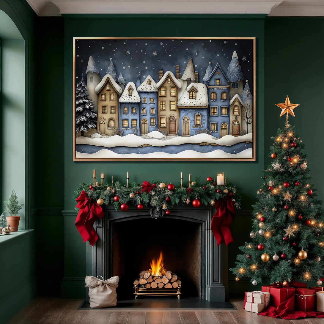 Framed Wall Art of a winter village scene in blue and beige tones. Cozy artwork for a warm Christmas interior.