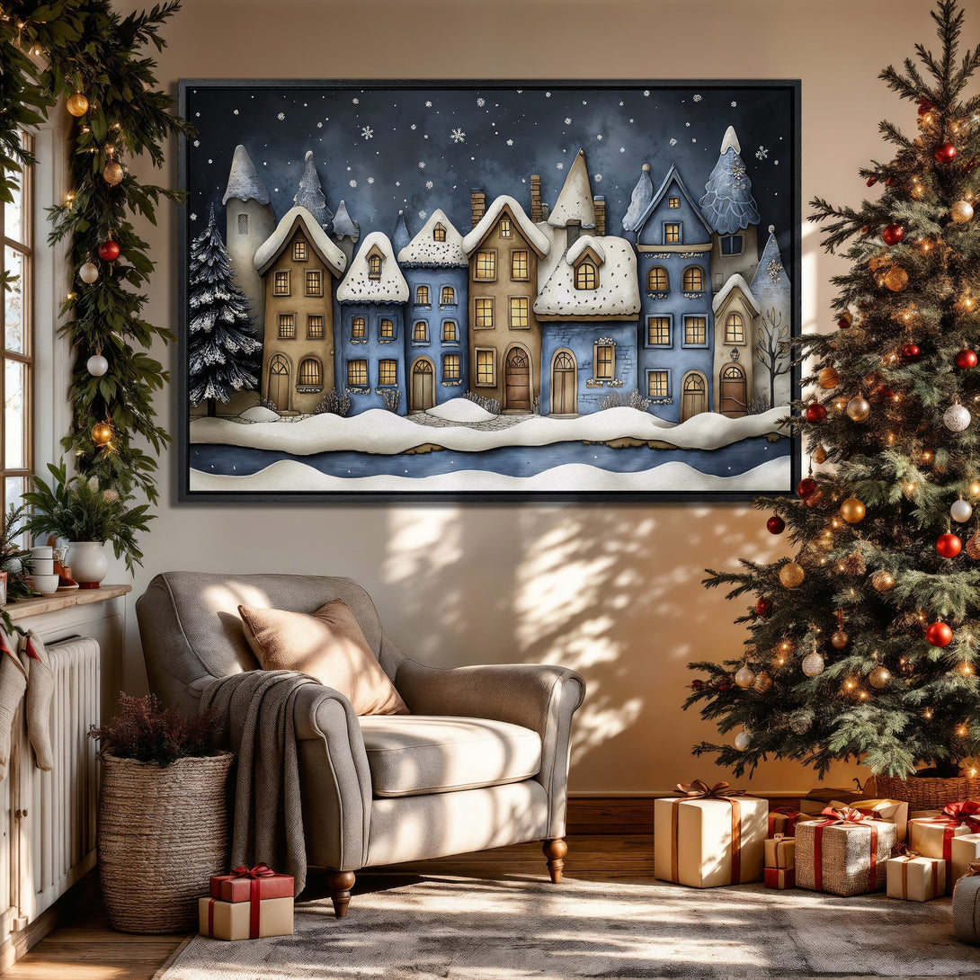 Framed Wall Art: Winter village scene in blue and beige tones. Cozy, whimsical art for your home. Perfect for holiday decor.