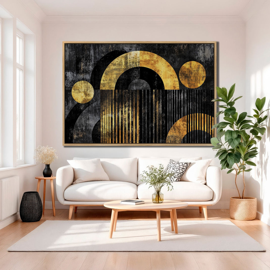 Framed Wall Art featuring an abstract geometric design in gold and black, displayed in a modern living room. Enhance your home decor with this stylish canvas print.