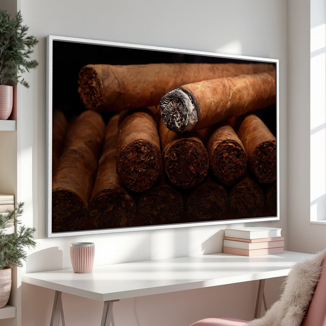 Framed Wall Art featuring a close-up of cigars with a warm, earthy color palette. Perfect for adding a touch of sophistication to any space.
