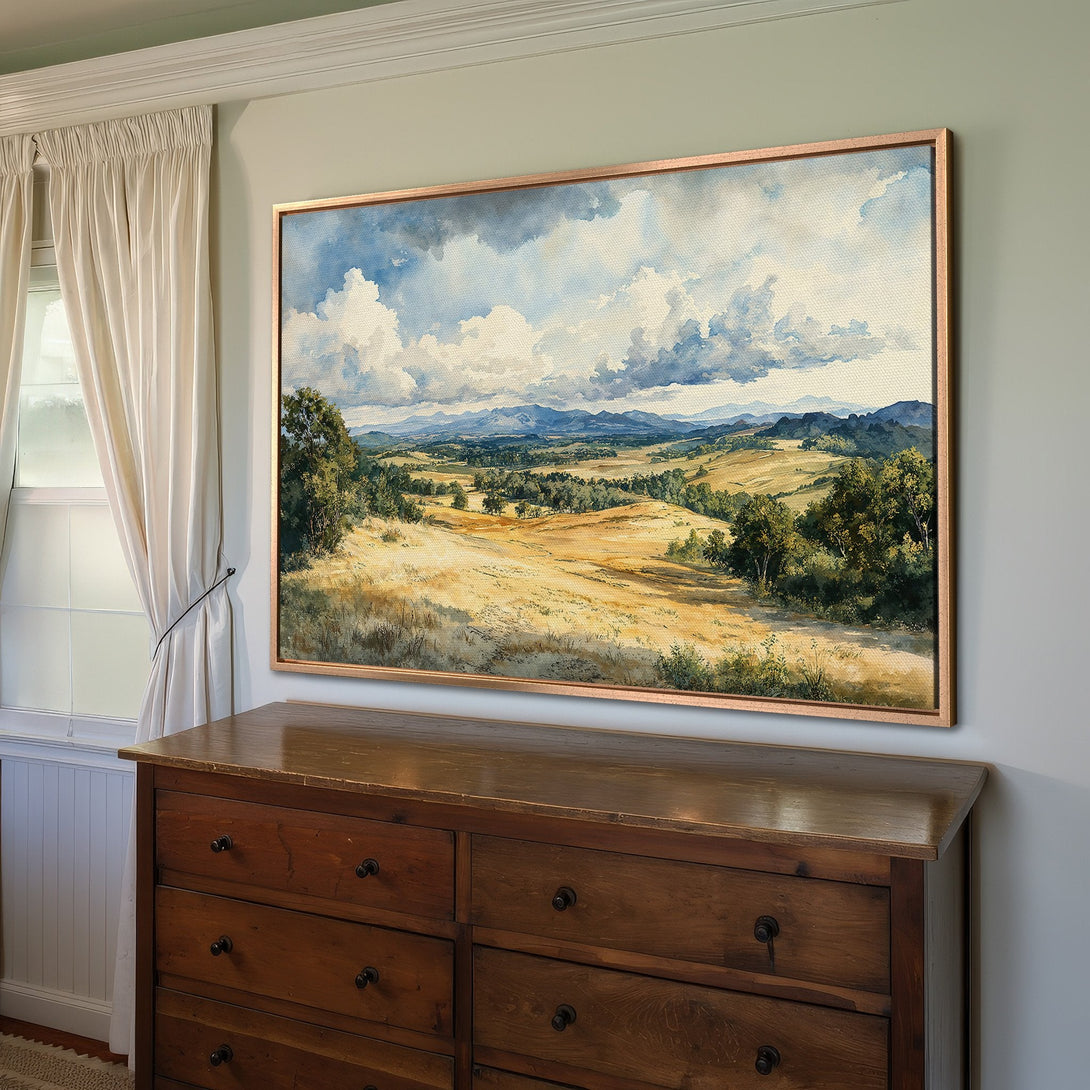 Framed Wall Art: Landscape Canvas Print with a serene countryside scene in warm yellows, greens, and blues. Perfect for adding a touch of nature to your home.