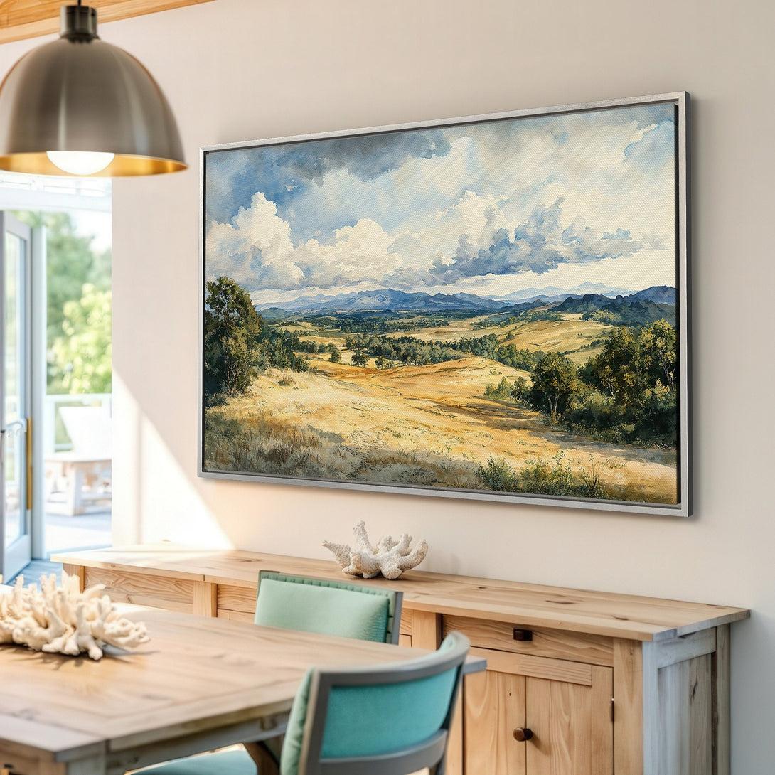 Framed Wall Art: Watercolor landscape Canvas Print with blue, green, and gold hues. Enhance your space with this serene countryside scene.