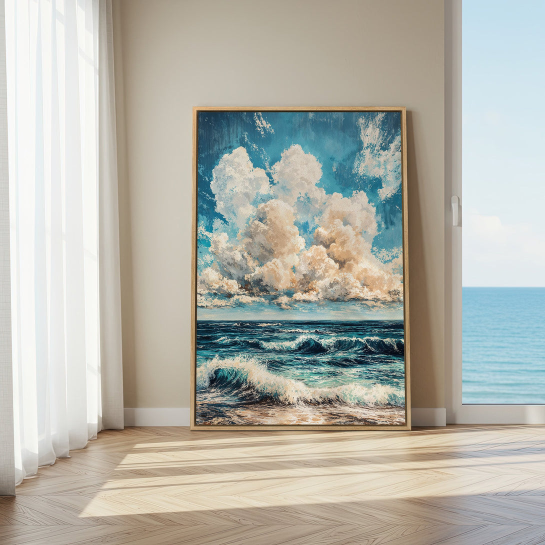 Framed Wall Art: Coastal scene Canvas Print with blue and white ocean waves and sky, displayed in a bright, modern interior.