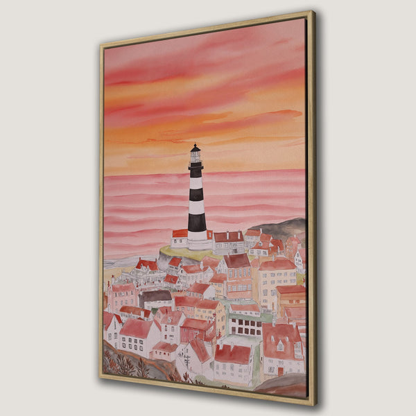 Framed Wall Art: Watercolor lighthouse art in warm sunset hues. Coastal town scene with a black and white lighthouse. Adds a cozy touch to any space.