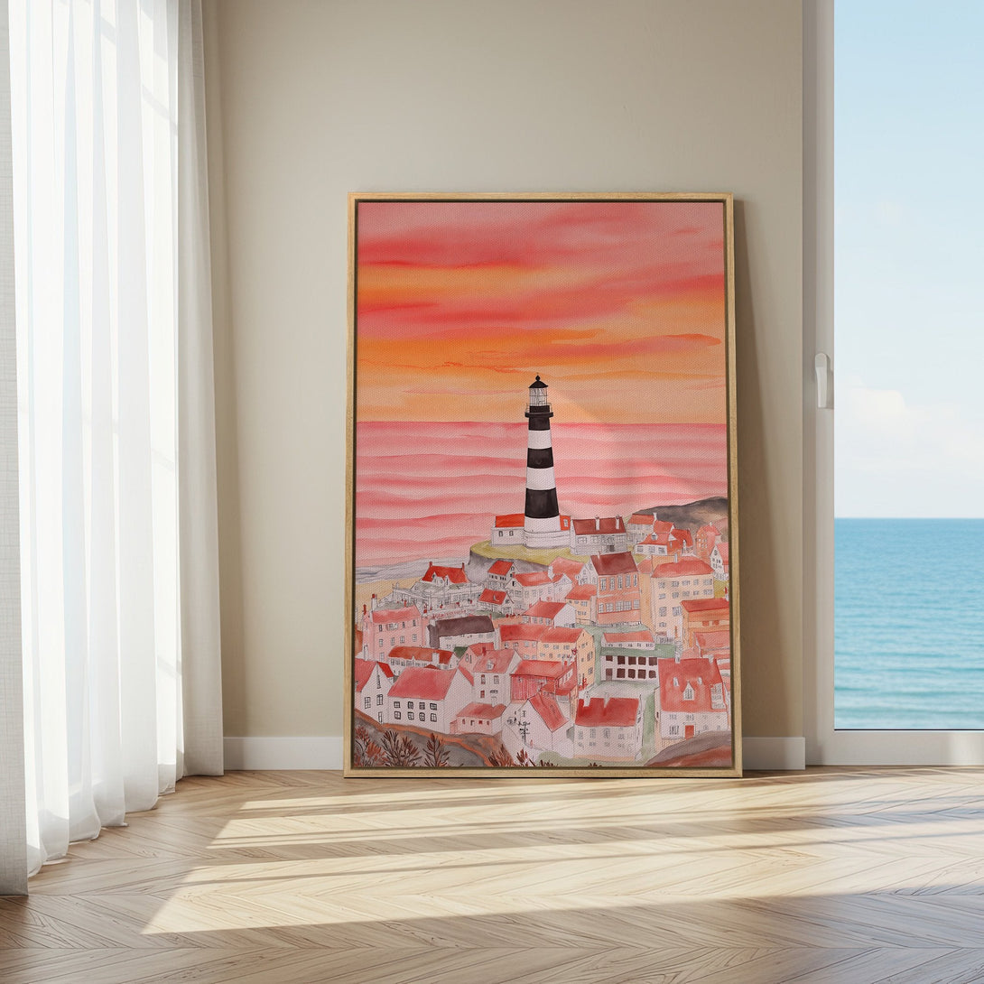 Framed Wall Art: Lighthouse and coastal town watercolor painting in warm orange and red tones. Perfect for adding a touch of seaside charm to your home.