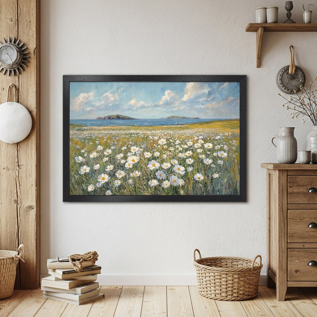 Framed Poster of a serene coastal landscape painting with white flowers, blue sky, and green fields. Warm, inviting color palette.