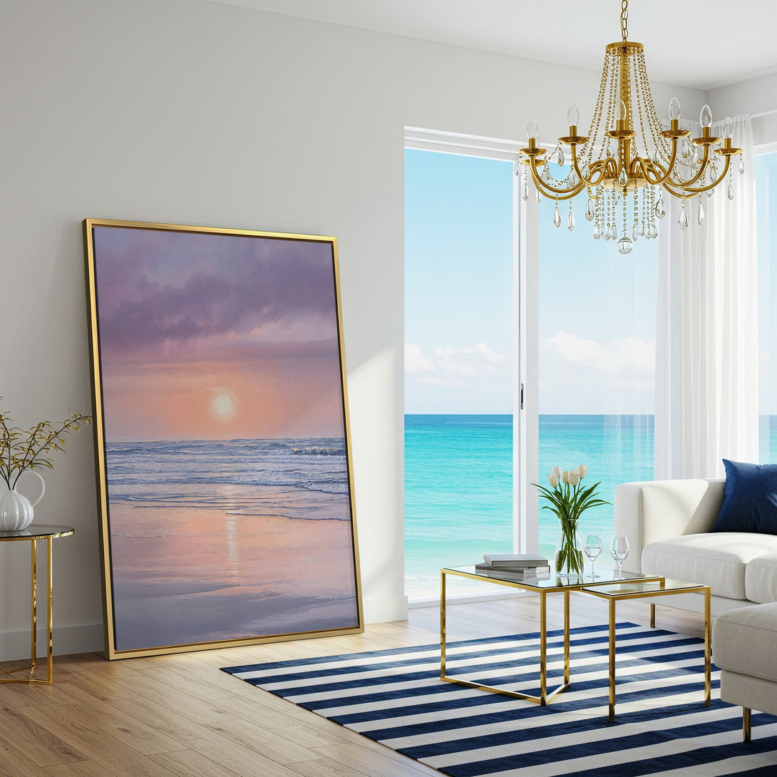 Canvas Print of a serene beach sunset in pastel pink and purple hues, displayed in a modern living room. Coastal wall art for a calming space.