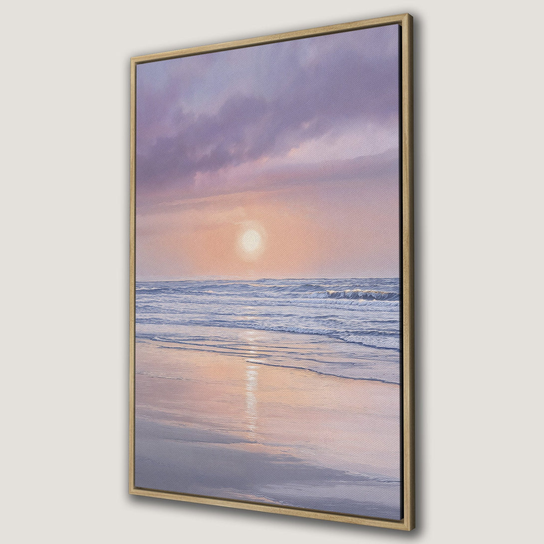Framed Wall Art Canvas Print of a serene beach sunset. Soft pastel colors of pink, purple, and blue create a calming coastal vibe. Perfect home decor.