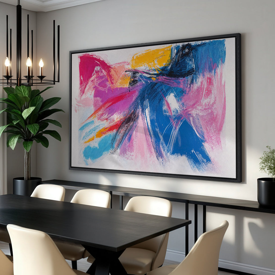 Framed Wall Art: Abstract expressionist canvas print in vibrant pink, blue, and yellow hues. Modern art for dining room decor. Shop now!