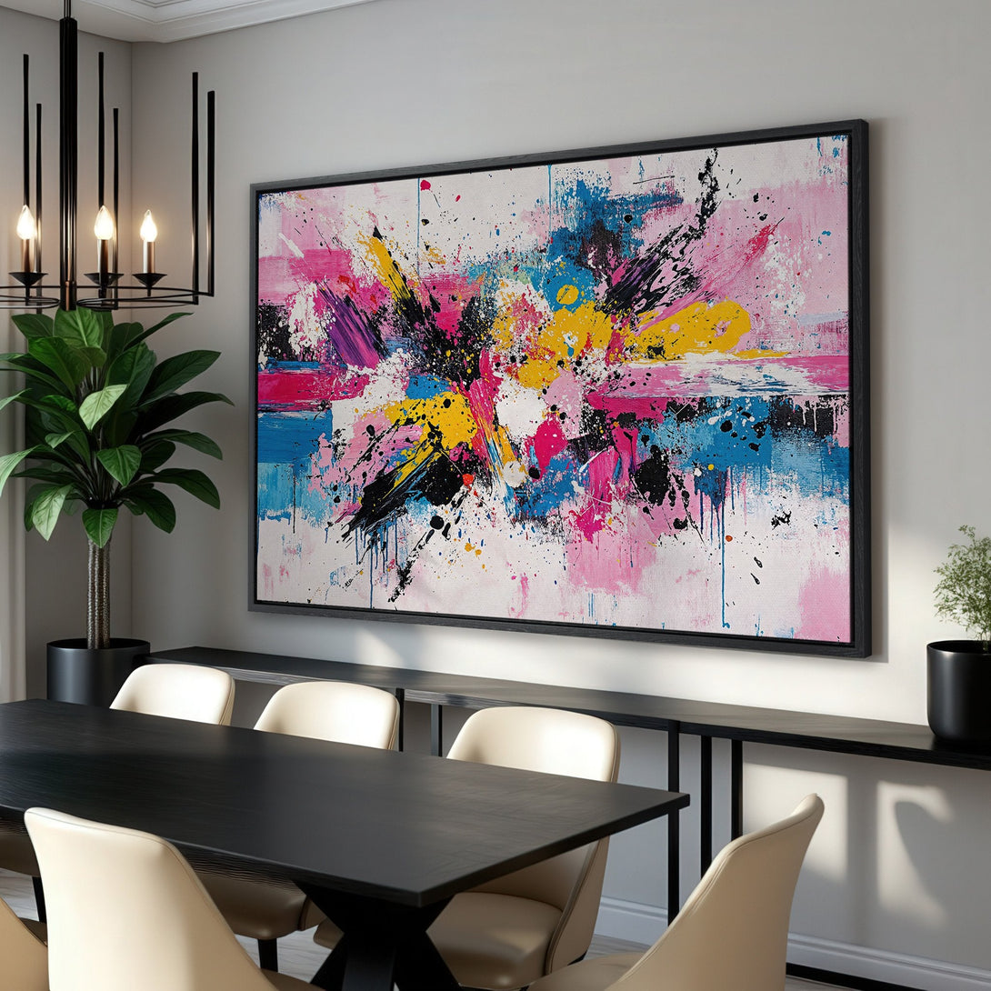 Framed Wall Art: Abstract expressionist canvas print in vibrant pink, blue, yellow, and black. Modern art for dining room decor.