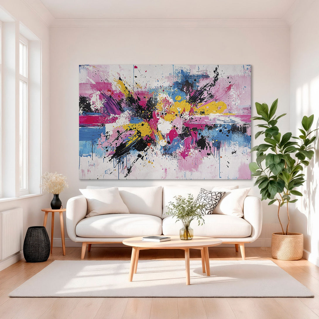 Framed Wall Art: Abstract expressionist canvas print with vibrant pink, blue, yellow, and black paint strokes. Modern art for living room decor.