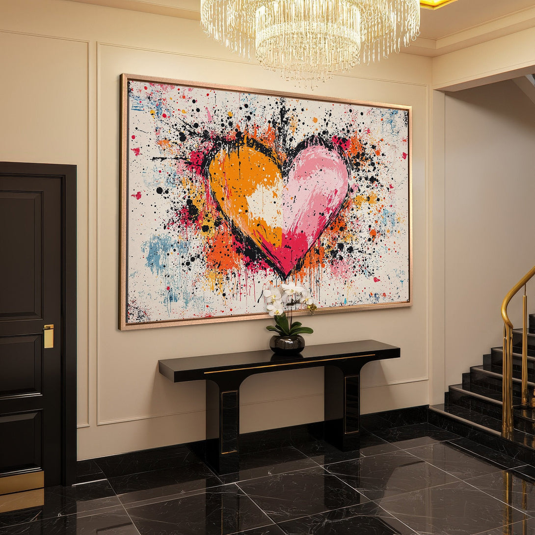 Framed Wall Art featuring a colorful abstract heart. Modern style with a vibrant palette of orange, pink, and black. Perfect for home decor.