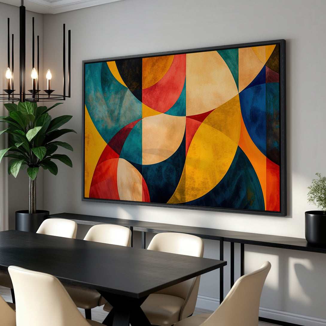 Framed Wall Art featuring an abstract geometric design in vibrant colors of blue, yellow, and red. Modern art for stylish home decor.