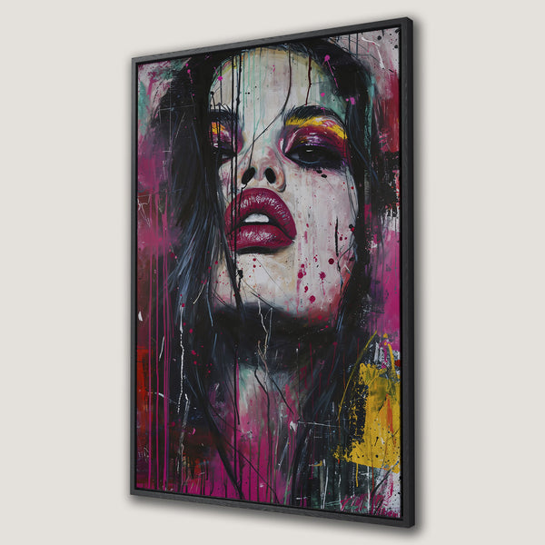 Framed Wall Art of a woman's face in vibrant abstract style. Bold pink, red, and yellow hues create a striking modern canvas print.