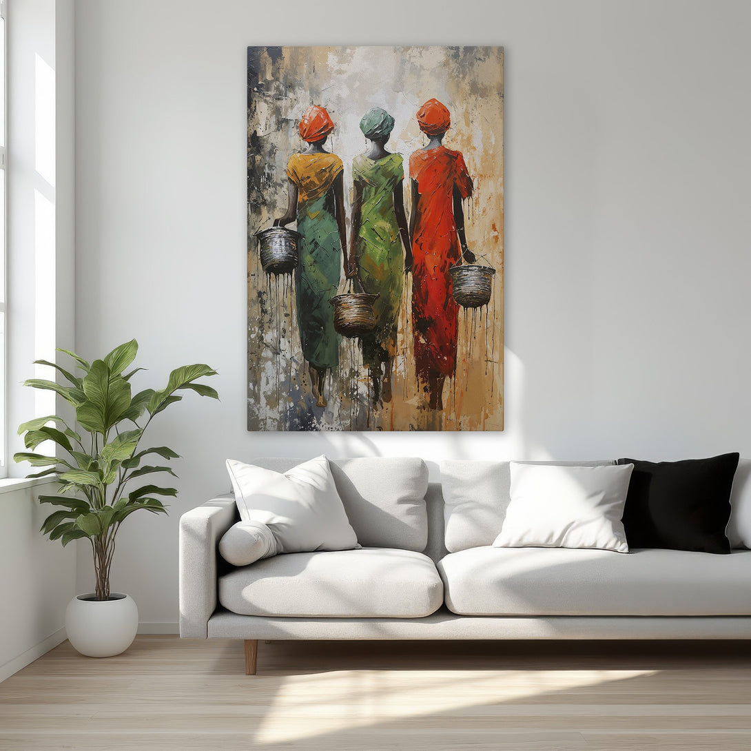 Framed Wall Art: Abstract painting of three women in colorful dresses. Warm, earthy tones with pops of red, green, and orange. Perfect bedroom decor.