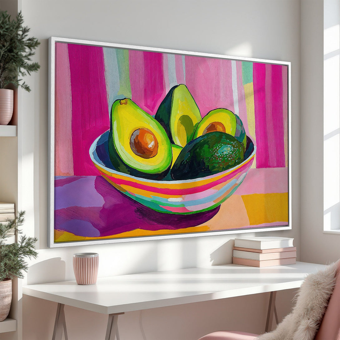 Framed Wall Art: Vibrant avocado painting in a modern style. Bold pink, green, and yellow color palette adds a pop of color to any space.