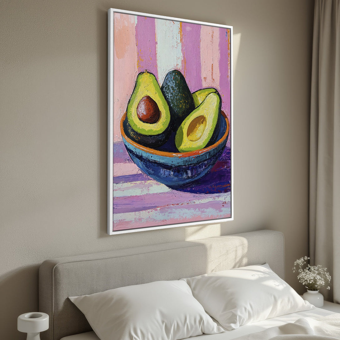 Framed Wall Art featuring a vibrant avocado still life painting. Modern, impressionistic style with a colorful pink, green, and blue palette. Perfect for kitchen decor.
