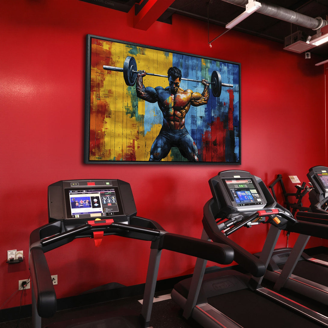 Framed Wall Art featuring a muscular weightlifter in an abstract style with a vibrant red, yellow, and blue color palette. Perfect for a gym or home decor.