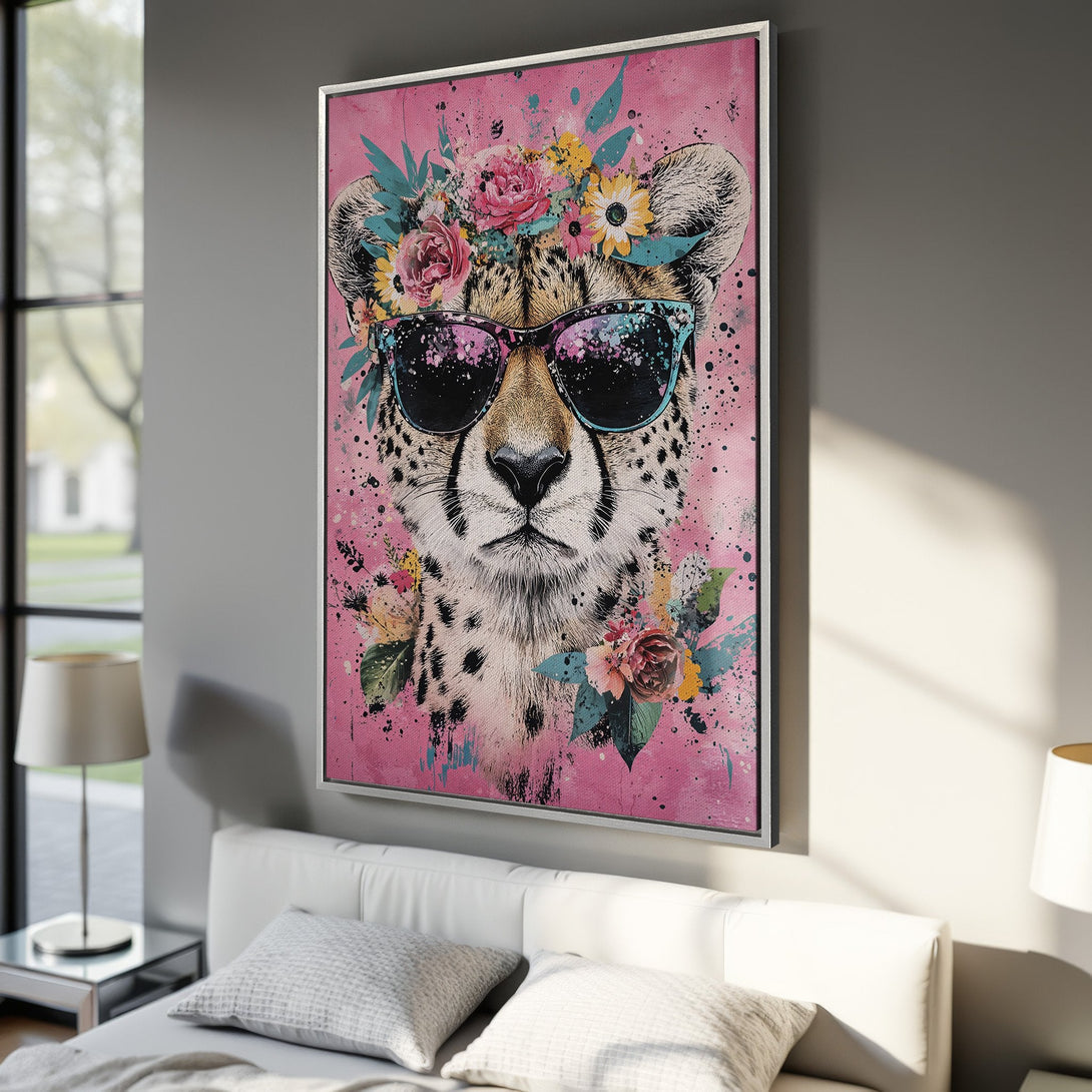 Framed Wall Art: Cheetah portrait with sunglasses and floral crown, pink background, modern style, vibrant colors. Perfect for bedroom decor.