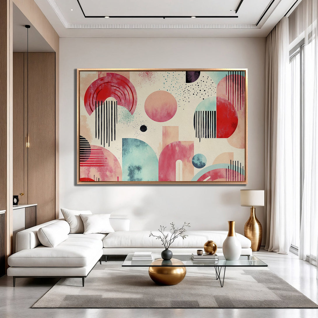 Framed Wall Art featuring abstract geometric shapes in red, pink, and teal. Modern art canvas print adds a pop of color to any interior.